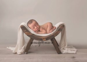 newborn boy on bench - phoenix newborn photographer